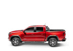 BAK 2024 Toyota Tacoma 6ft Bed BAKFlip MX4 Bed Cover on red truck