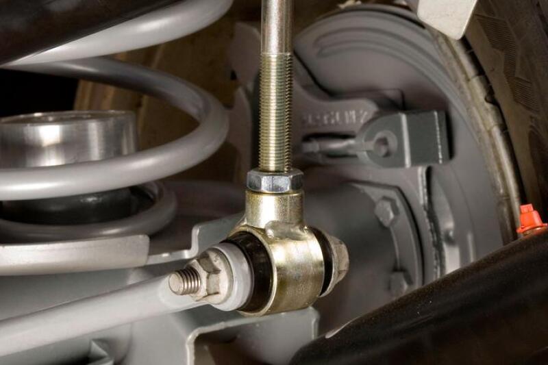 JKS Manufacturing Jeep Wrangler TJ/LJ Adjustable Sway Bar Links - Rear close-up image of off road suspension components