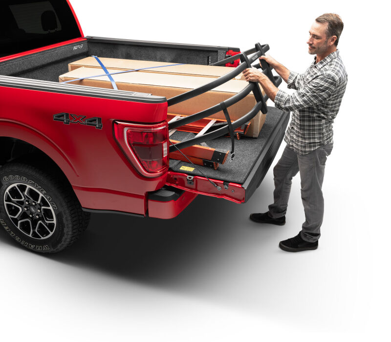 AMP Research 04-22 Ford F-150 (Excl. 04 Heritage) / 07-21 Toyota Tundra Bedxtender HD Max - Black in use for cargo