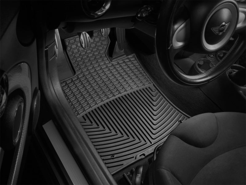 WeatherTech 02-06 Mini Clubman Front Rubber Mats - Black installed in car