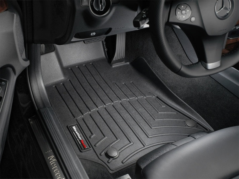 WeatherTech 10+ Mercedes-Benz E-Class Front FloorLiner - Black installed in a car.