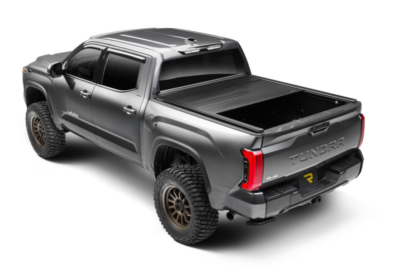 Retrax 2024 Ford F-150 SuperCrew/Super Cab 5.5ft. Bed Retrax EQ with offroad wheels and accessories.