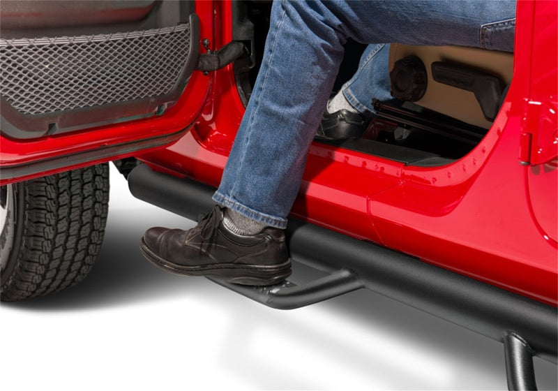 N-Fab Nerf Step 2018 Jeep Wrangler JL SUV 4 Door- Tex. Black - W2W - 3in. installation with user stepping in.
