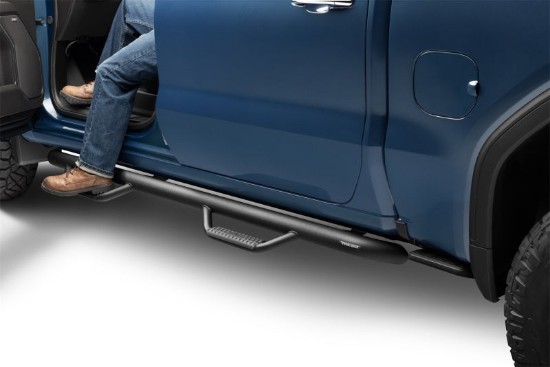 N-Fab Nerf Step 2019 Chevy/GMC 1500 Crew Cab - Cab Length - Tex. Black - 3in on truck with foot stepping on it