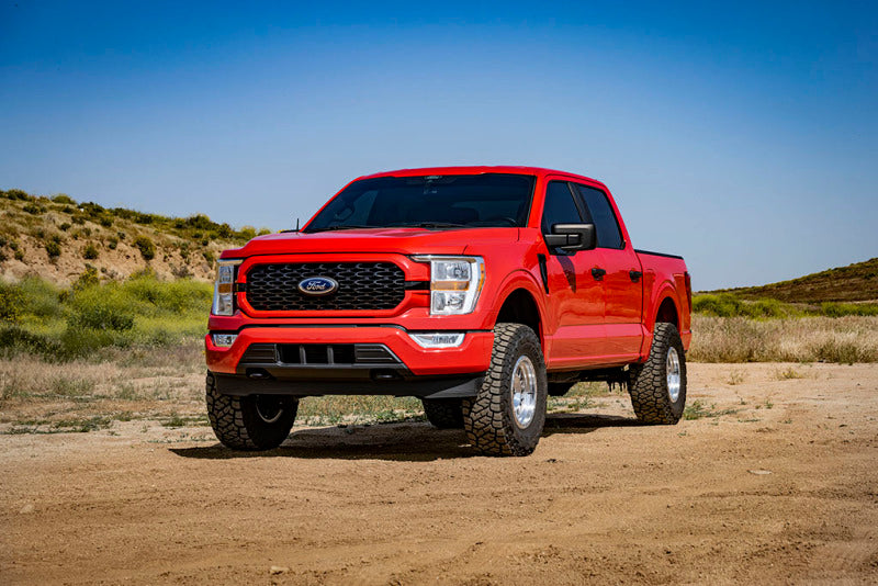 ICON 21-23 Ford F150 Tremor 2.5-3in 2.5 Series VS IR Coilover Kit on rugged terrain