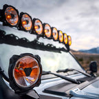 KC HiLiTES Gravity Titan LED 6in. - Pair Pack (Spot Beam) on truck roof, optimal offroad lighting.