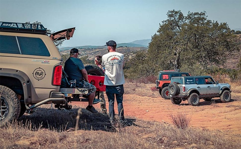 MagnaFlow 19+ Jeep Wrangler JL Overland Series Cat-Back Performance Exhaust System in offroad setting.