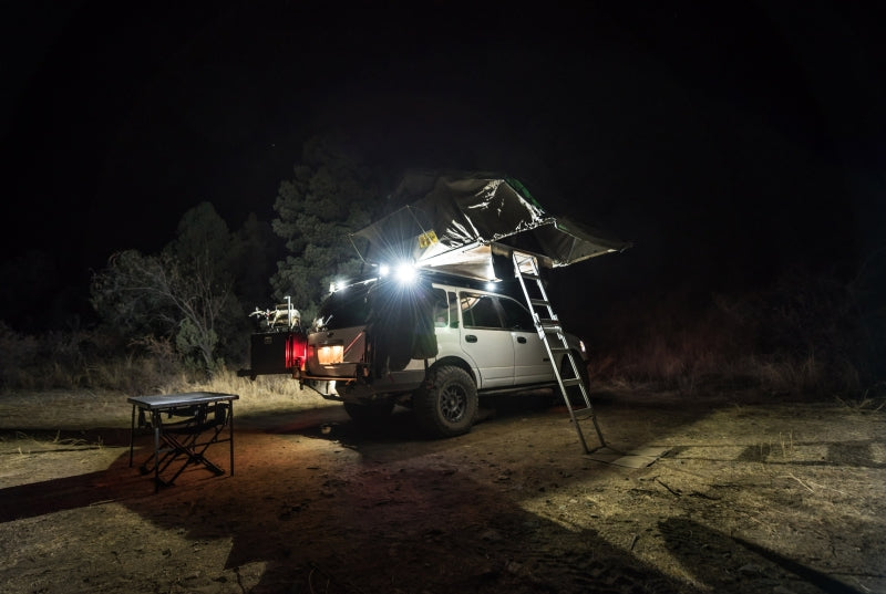 KC HiLiTES C-Series C2 LED 2in. Backup Area Flood Light 20w (Pair Pack System) - Black on off-road vehicle at night.