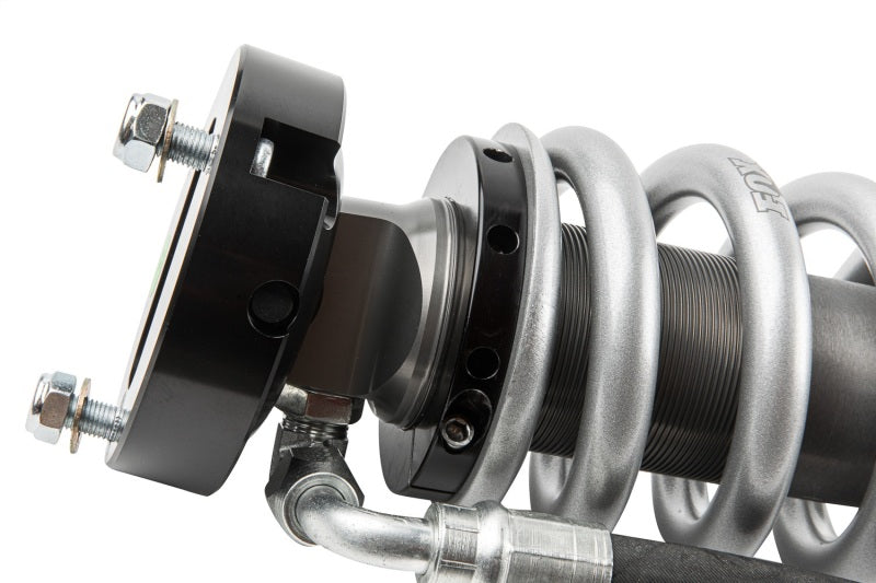 Fox 19+ Ram 1500 2.5 Perf. Series 6in R/R Front Adjustable Coilover 2in Lift DSC close-up view