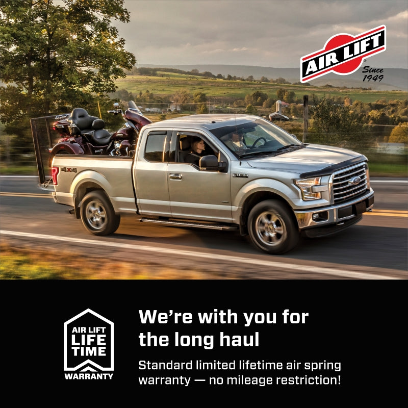 AirLift Performance 21-24 Ford Bronco LoadLifter 5000 Air Spring Kit on truck with motorcycle in back for towing