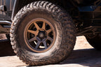 ICON Rebound Pro 17x8.5 6x5.5 0mm Offset 4.75in BS 106.1mm Bore Bronze Wheel on offroad tire