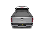 BAK 19-21 Dodge Ram w/ Ram Box Revolver X4s 5.7ft Bed Cover (New Body Style 1500 Only) on silver truck