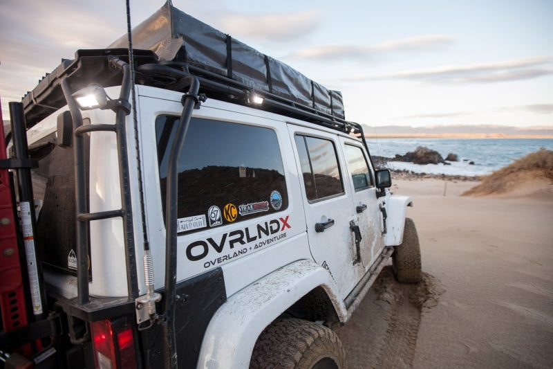 KC HiLiTES C-Series C2 LED 2in. Backup Area Flood Light 20w (Pair Pack System) - Black on offroad Jeep in sandy terrain