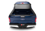 BAK 21-22 Ford F-150 (Incl. 2022 Lightning) BAKFlip FiberMax 5.7ft Bed Cover installed on a blue Ford truck.