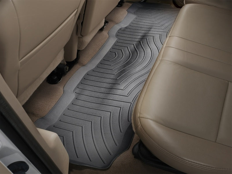 WeatherTech 99-10 Ford F250 Super Duty Crew Rear FloorLiner - Black installed in truck interior.