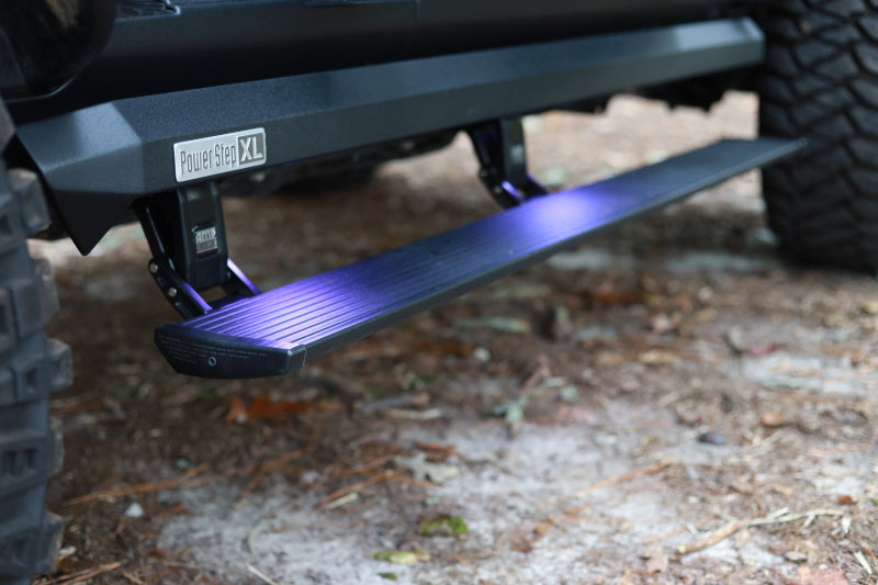 AMP Research 19-22 Ram 1500 Crew Cab PowerStep XL - Black (Incl OEM Style Illumination) running board with LED light.