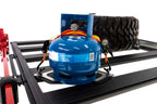 ARB BASE Rack Gas Bottle Holder securely holding a blue gas canister on offroad truck accessories.