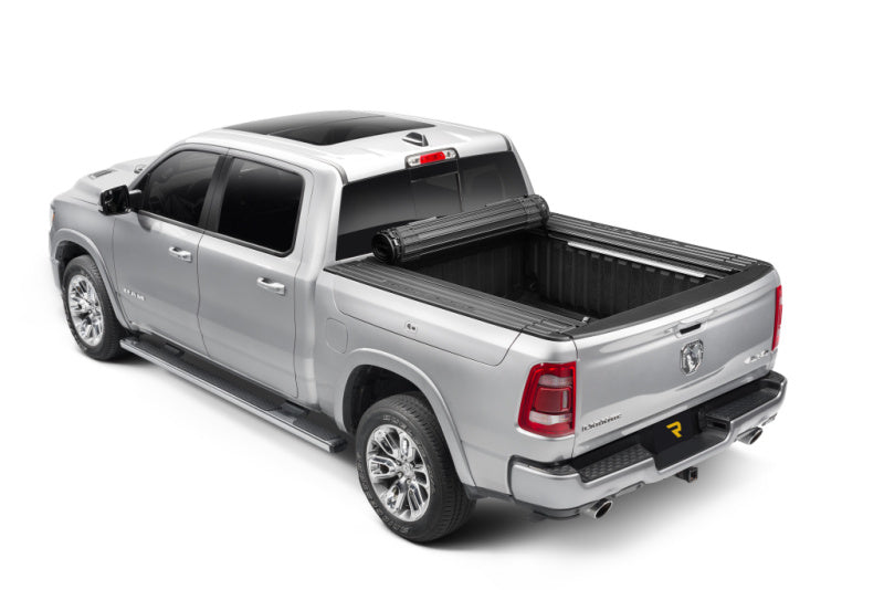 BAK 19-21 Dodge Ram w/ Ram Box Revolver X4s 5.7ft Bed Cover (New Body Style 1500 Only) installed on silver truck