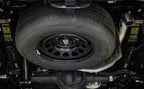 MagnaFlow 2023+ Chevy Colorado Overland Series Cat-Back Exhaust system image showing clear tire and exhaust layout.