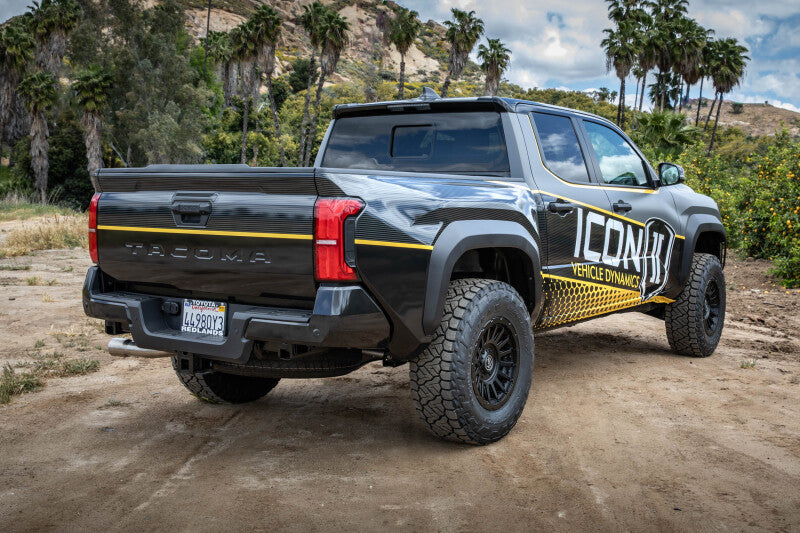 ICON 2024+ Tacoma .5in Lift Triple Rate Rear Coil Spring Kit on offroad truck with exterior accessories