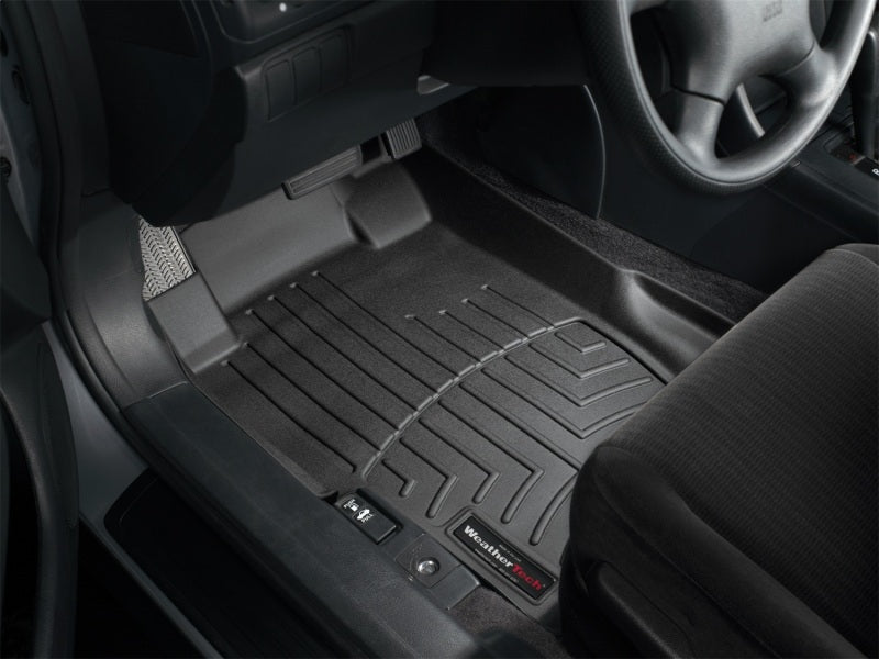WeatherTech 03-07 Honda Accord Front FloorLiner - Black in vehicle cabin.