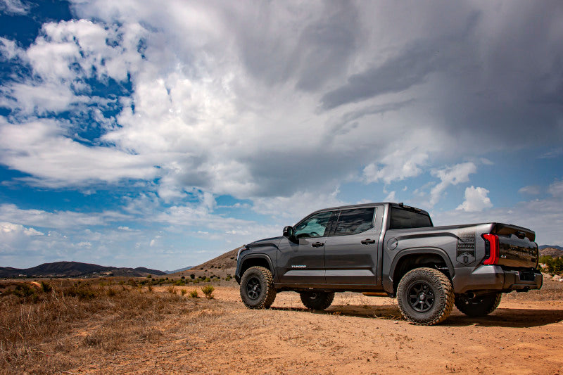 ICON 22-25 Toyota Tundra 0-1.5in Rear 3.0 Series Shocks VS CDXS RR - Pair on offroad terrain
