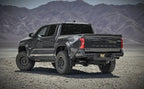 Magnaflow 2024 Toyota Tacoma Speq Series Cat-back Exhaust System (Black Tips) on offroad truck with black wheels