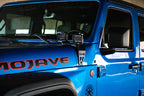 DV8 Offroad 20-22 Jeep JL 392/ Jeep JT Mojave Edition Dual Pod Light Mounts installed on blue Jeep Mojave.