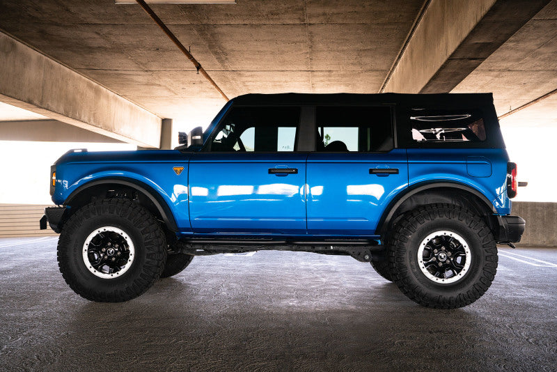 DV8 Offroad 21-22 Ford Bronco OE Plus Series Side Steps on blue Bronco