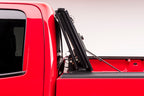 BAK 04-14 Chevy Silverado 1500 5ft 8in Bed BAKFlip MX4 Matte Finish truck bed cover open on red truck.