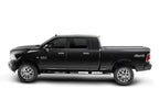Retrax 09-up Ram 1500 6.5ft Bed / 10-up Short Bed RetraxONE MX truck profile view with stylish accessories.