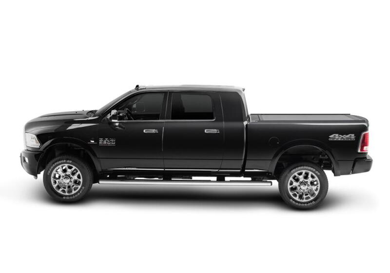 Retrax 09-up Ram 1500 6.5ft Bed / 10-up Short Bed RetraxONE MX truck profile view with stylish accessories.