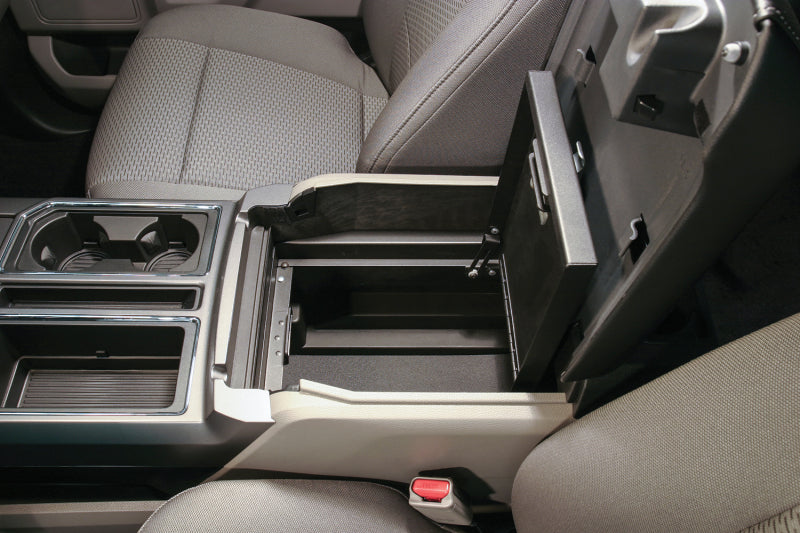 Tuffy Console Safe W/ Combo Lock For Ford Fseries Flow Thru Console installed in truck's interior.