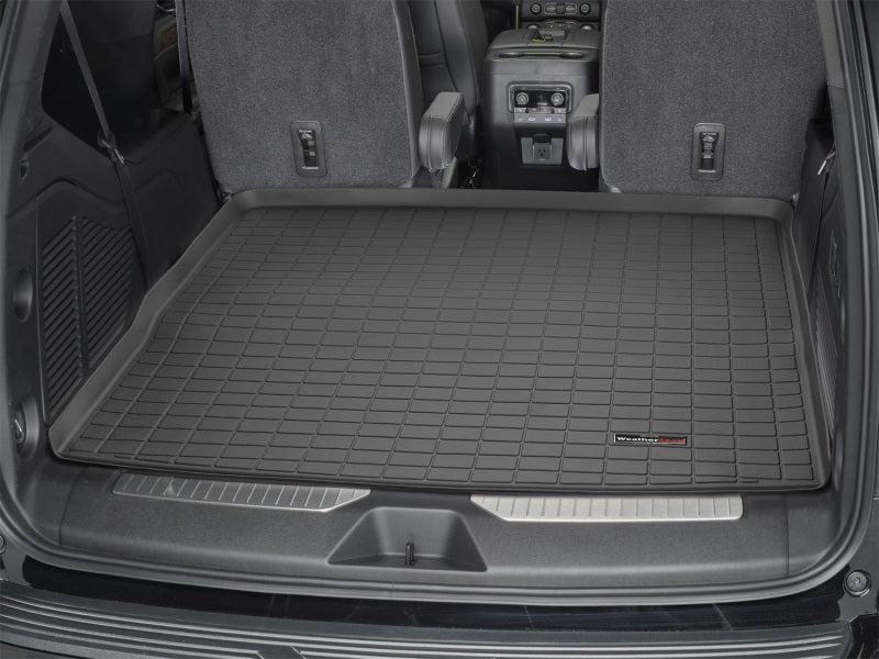 WeatherTech 2021+ Chevrolet Yukon / Yukon Denali Cargo Liners - Black installed in trunk for full protection