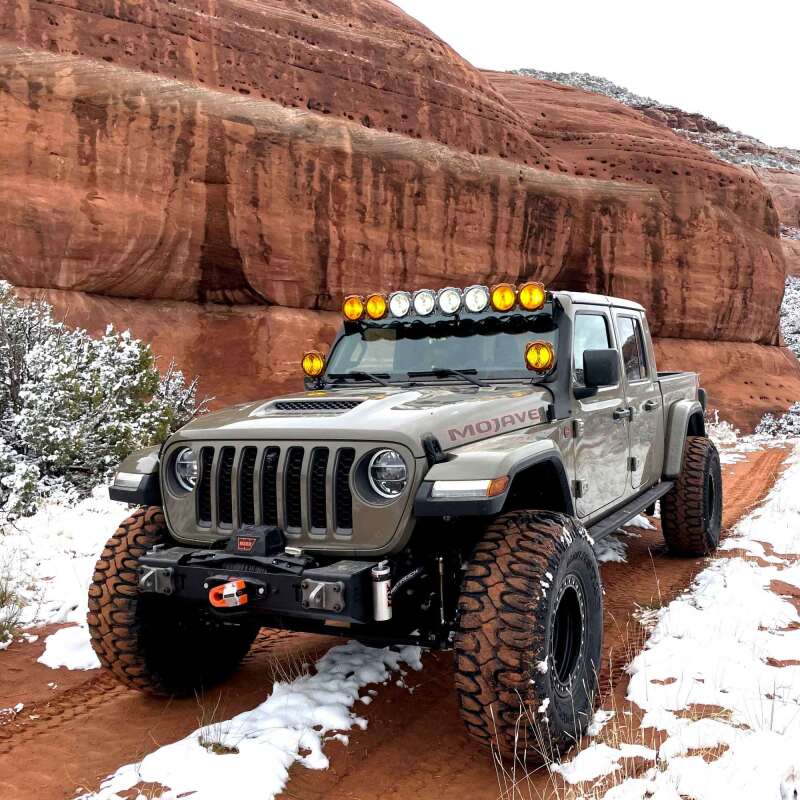 KC HiLiTES 21-23 Jeep 392/Mojave Overhead Mount Bracket Set for 50in. Light Bar (Pair) on Jeep Gladiator in snowy terrain