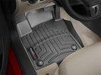 WeatherTech 11+ Volkswagen Jetta Front FloorLiner - Black installed in car interior, offering protection and fit.