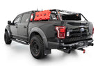 Addictive Desert Designs17-20 Ford F-150 Raptor Phantom Front Bumper on offroad truck with exterior accessories.