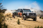 Fox 05+ Ford SD 2.0 Performance Series 11.6in. Smooth Body IFP Rear Shock (Alum) / 0-1in Lift in off-road action
