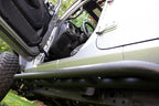 Fishbone Offroad 2018+ Jeep Wrangler JL Step Slider 4 Door side view with offroad tires.