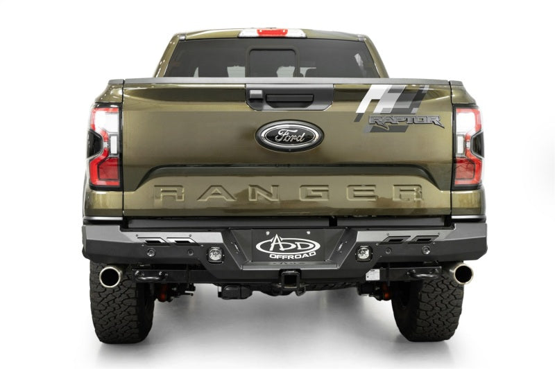 Addictive Desert Designs2024+ Ford Ranger Raptor Phantom Rear Bumper on truck, featuring offroad parts and upgrades.