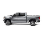 BAK 2020 Chevy Silverado 2500/3500 HD 6ft 9in Bed BAKFlip F1 truck side view with offroad wheels and accessories