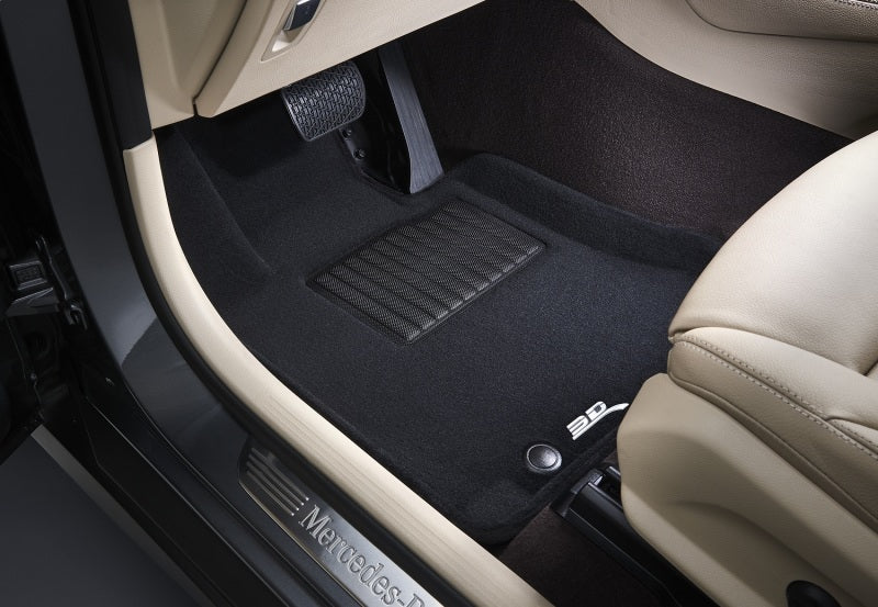 3D MAXpider 20-23 Tesla Model 3 R1 R2 - Elegant Black floor liners in Mercedes vehicle.