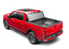 BAK 21-22 Ford F-150 (Incl. 2022 Lightning) BAKFlip MX4 5.7ft Bed Cover - Matte Finish on a red truck