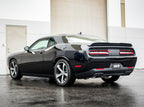 Borla 16-17 Dodge Challenger R/T 5.7L MT/AT ATAK Catback Exhaust (w/MDS Valves ONLY) on sleek black car.