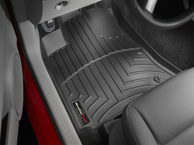 WeatherTech 05-08 Dodge Magnum Front FloorLiner - Black installed in vehicle.