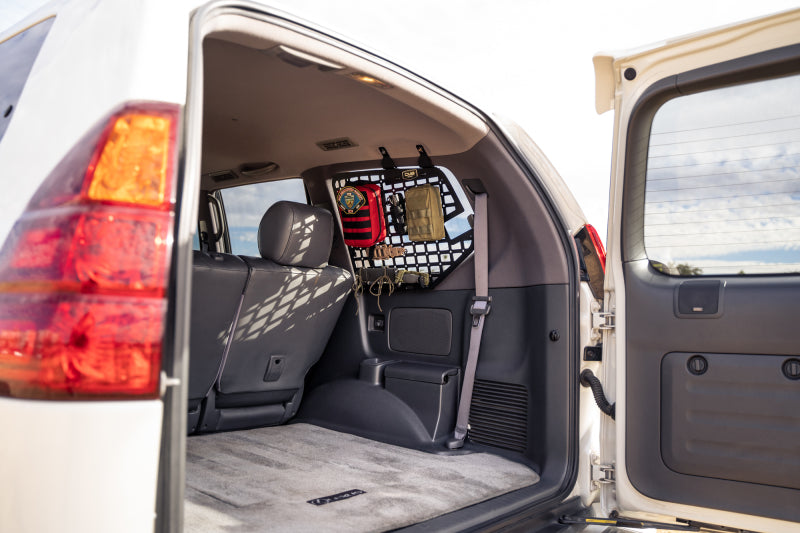 DV8 Offroad 03-09 Lexus GX 470 Rear Window Molle Storage Panels installed in SUV for added offroad storage.