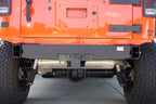 Fishbone Offroad 07-18 Jeep Wrangler JK Rubicon/Unlimited Rear Bumper Delete image on an orange Jeep Wrangler.