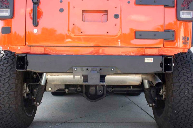 Fishbone Offroad 07-18 Jeep Wrangler JK Rubicon/Unlimited Rear Bumper Delete image on an orange Jeep Wrangler.