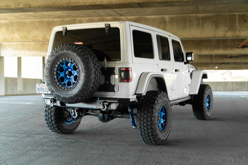 DV8 Offroad 18-23 Wrangler JL FS-7 Series Rear Bumper on Jeep with offroad tires and wheels.