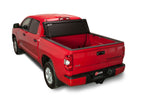 BAK 2024 Toyota Tacoma 5ft Bed BAKFlip Fibermax Bed Cover installed on red truck